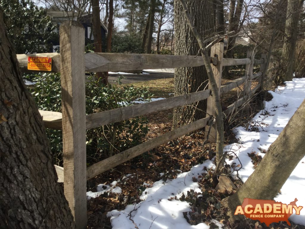 3-Rail rustic split wood rail partition installed by Academy Fence Company in Orange, NJ.