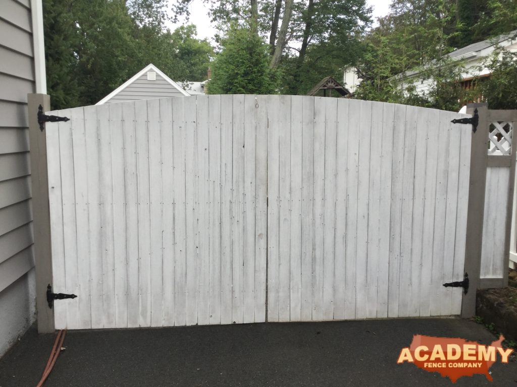 Residential Driveway Gate Cedar Solid Board Convex Fence Installation Academy Fence Company Verona New Jersey