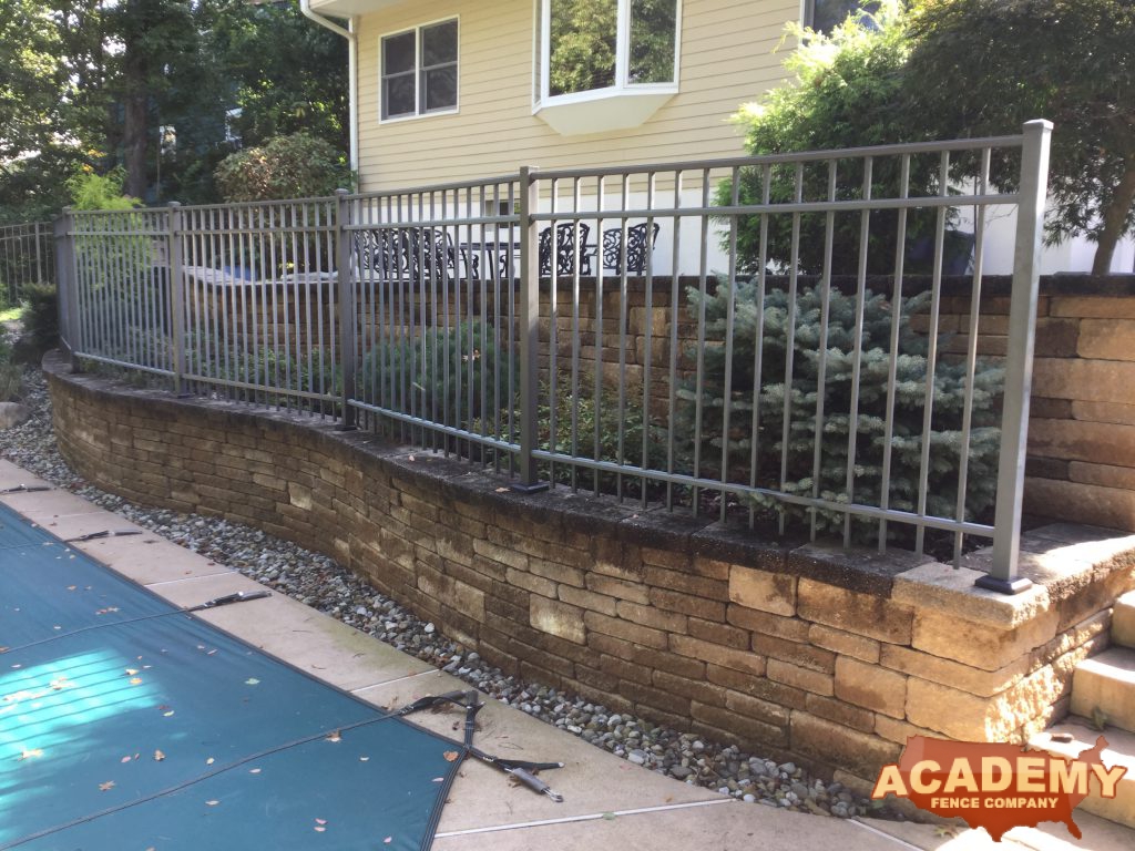 Pool Fence on wall Bronze Aluminum Picket Decorative Ornamental Fence installation Academy Fence Company West Caldwell New Jersey Residential