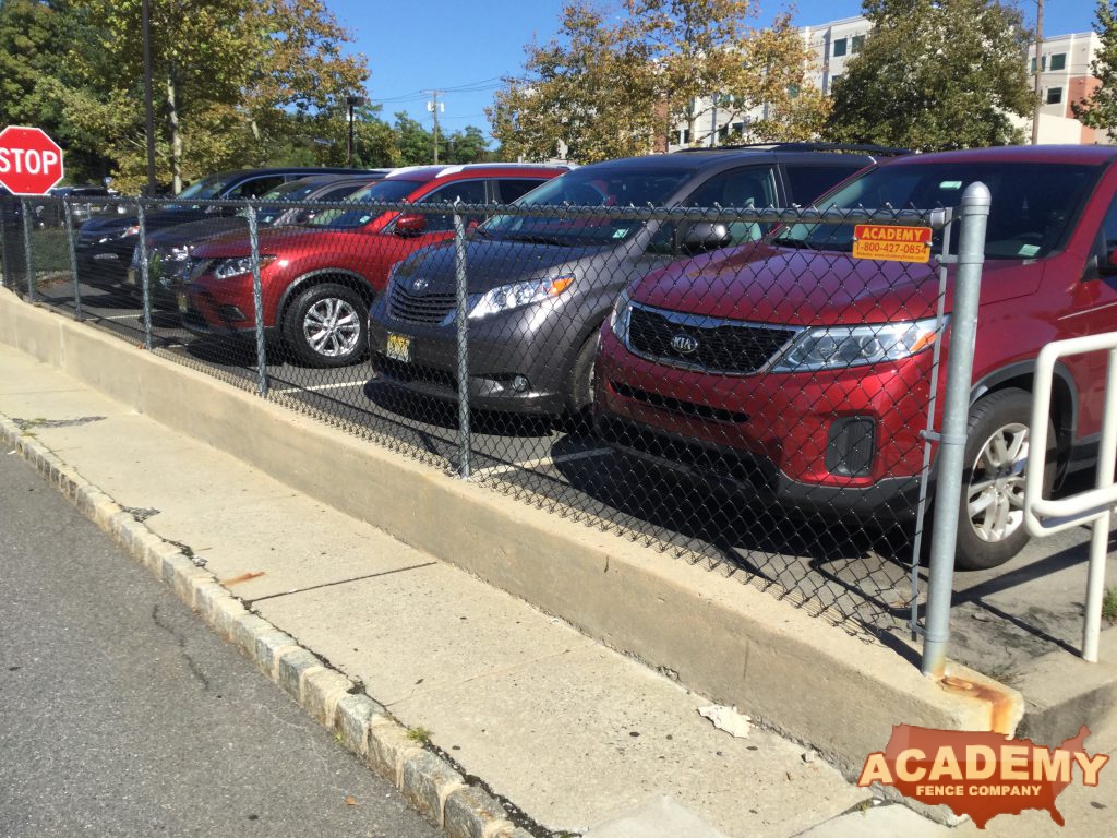 Saint Barnabus Hospital Parking lot Chainlink Fence on wall Installation Commercial Residential Academy Fence Company Livingston New Jersey Essex County