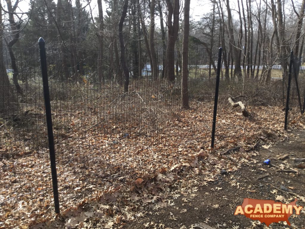 8′ black wire deer fence installed in Caldwell Essex County NJ, by Academy Fence Company.