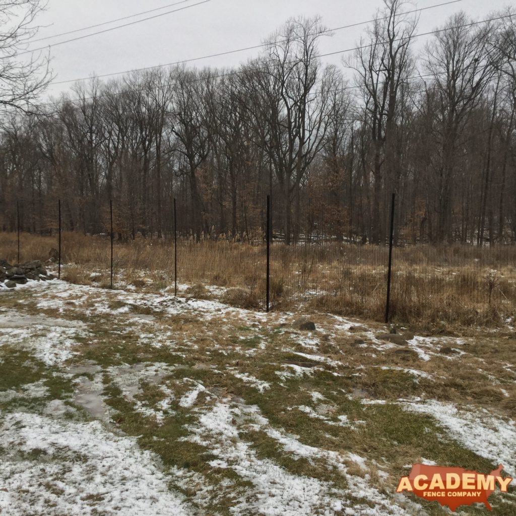 8′ black wire deer fence installed in South Orange NJ, by Academy Fence Company.