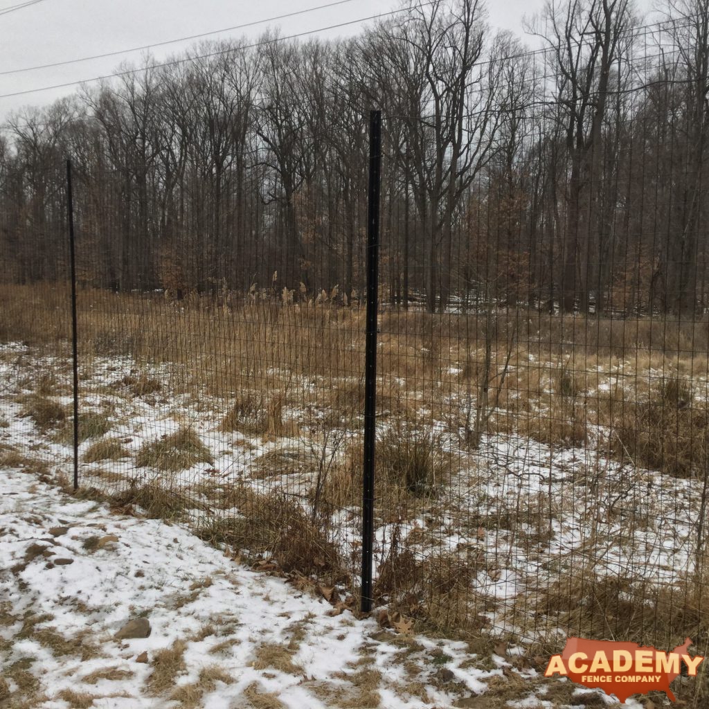 8′ black wire deer fence installed in South Orange NJ, by Academy Fence Company.