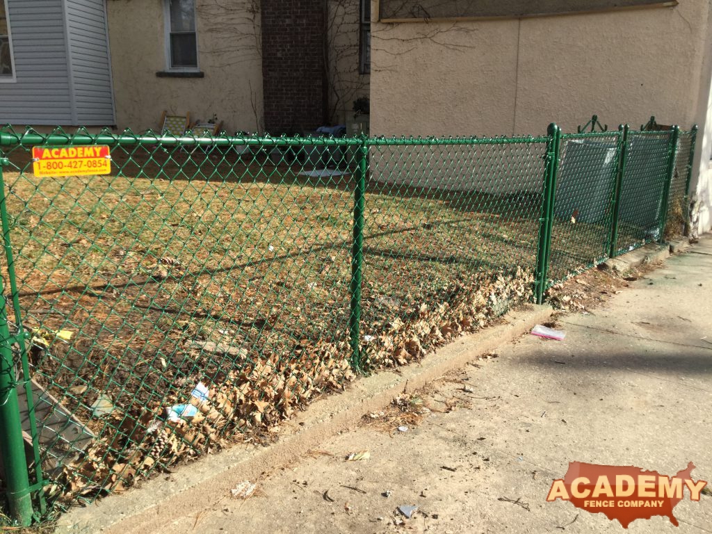 Residential green chain link fence installed in Belleville, NJ by Academy Fence Company