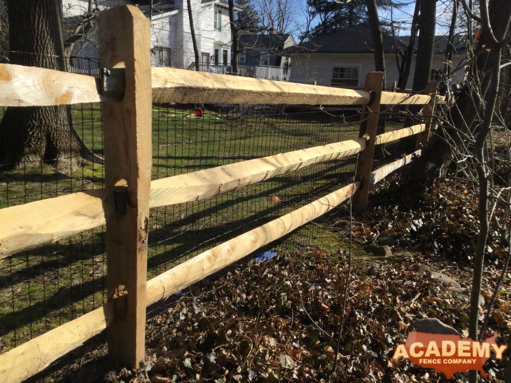 Post and rail with welded wire mesh attached, installed by Academy Fence Company in Essex Fells, NJ, Essex County.