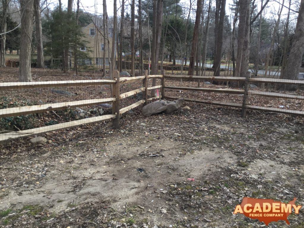 wood rail fence, Post and rail with welded wire mesh attached installed by Academy Fence Company in North Caldwell, NJ, Essex County.