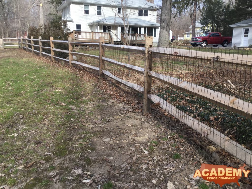 Post and rail with welded wire mesh attached installed by Academy Fence Company in Verona, NJ, Essex County.