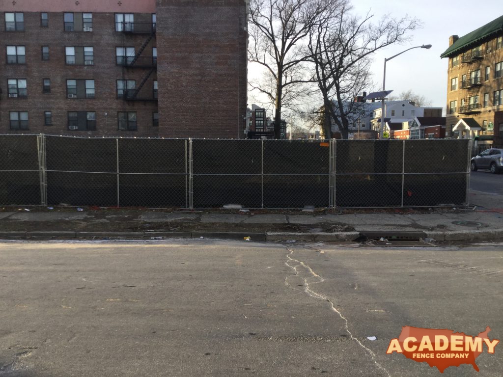 6' temporary chainlink construction fence panels installed by Academy Fence Company in Newark, NJ.