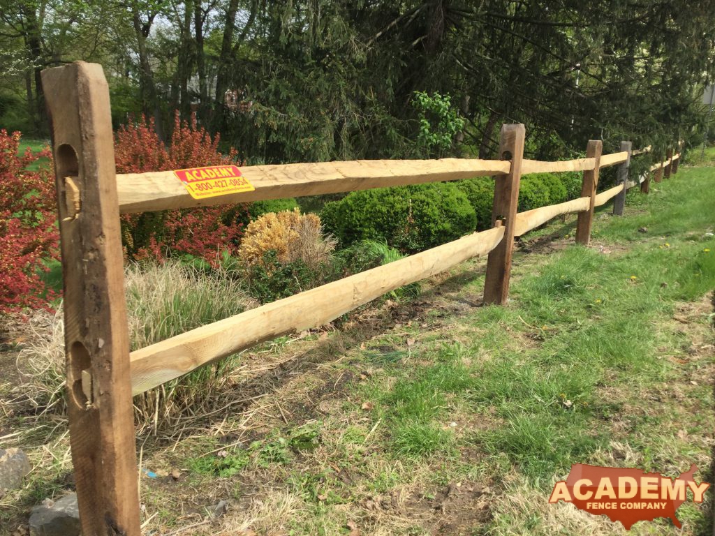 This is an Academy Fence Installation of a 2 rail rustic post and rail fence in Basking Ridge, Someset County, New Jersey