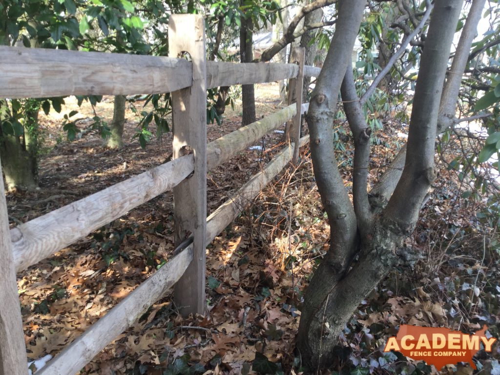 3-Rail rustic split wood rail partition installed by Academy Fence Company in Watchung, NJ.