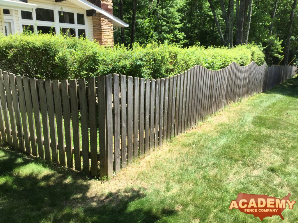 cedar concave picket fence install swooped weathered cedar