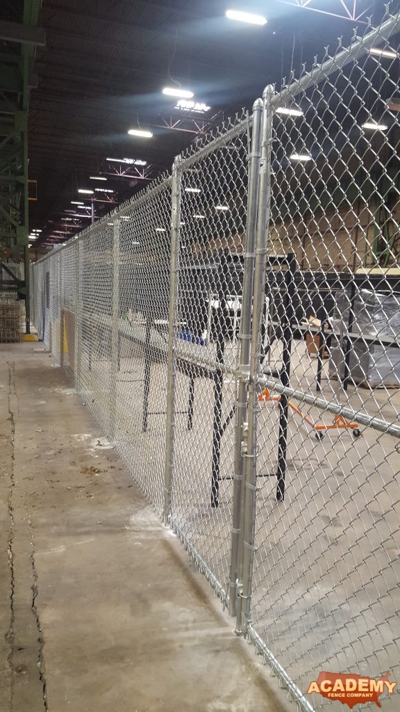 8' high indoor security chain link fence installed by Academy Fence Company.