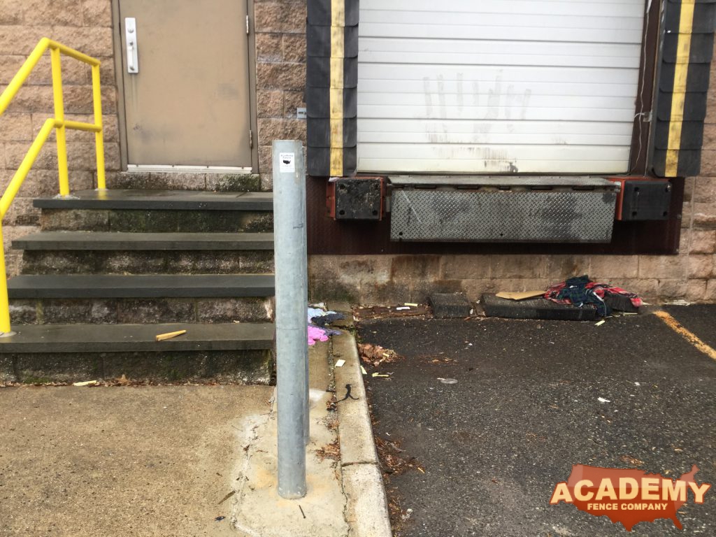 Academy Fence Company Installation of 4" Commercial Bumper post/bollard