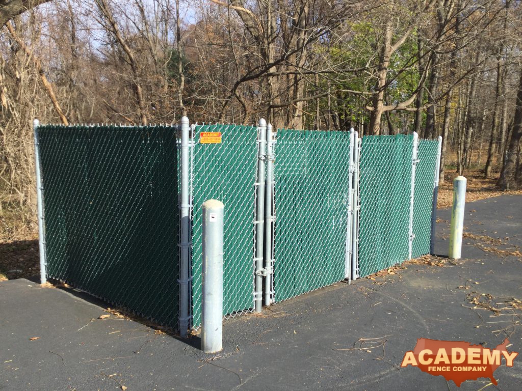 Commercial dumpster Garbage enclosure Chainlink Fence with privacy slats bumper posts installation Academy Fence Company Boonton New Jersey