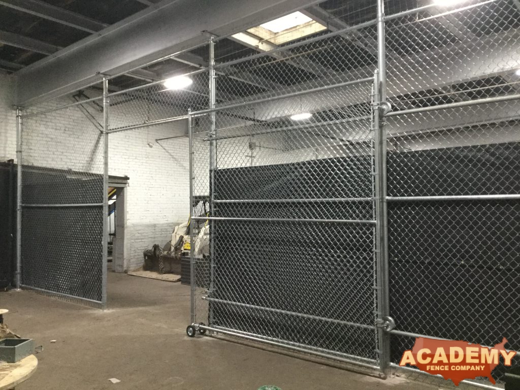 Picture of an indoor partition warehouse fence enclosure - chain link with gate