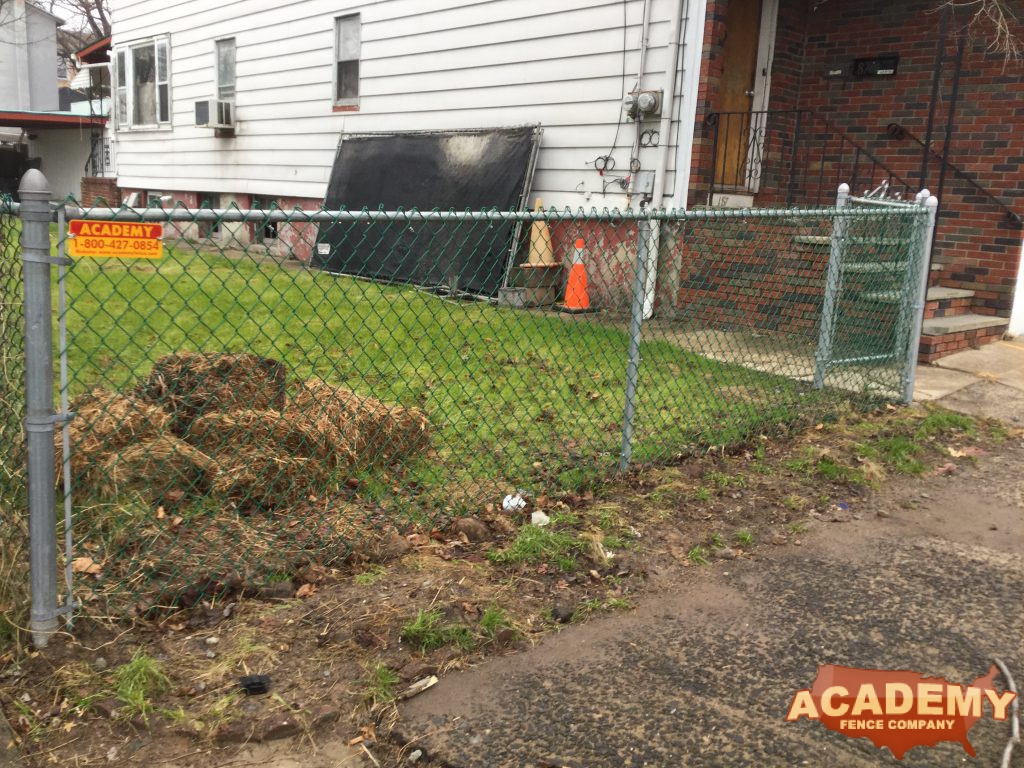 Academy Fence Company Installation of a 48 inch tall residential chain link fence