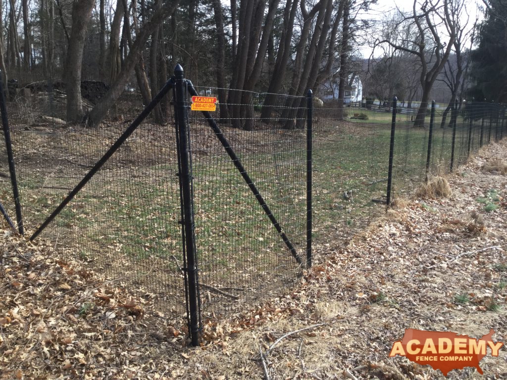 8′ high black wire deer fence is installed in Montville, NJ, by Academy Fence Company.