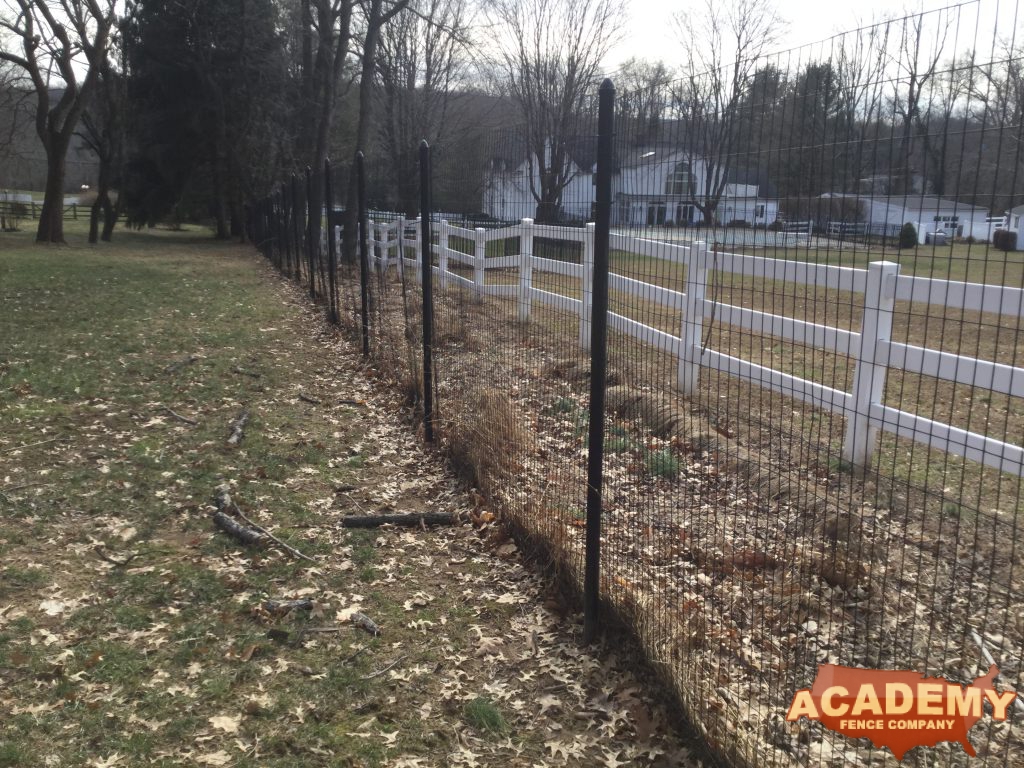 8′ black wire deer fence installed inSummit NJ, by Academy Fence Company.