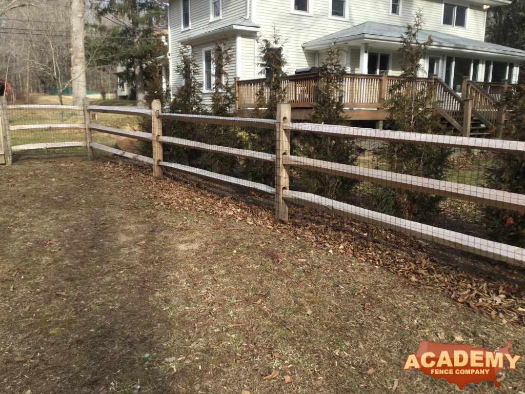 Post and rail with welded wire mesh attached installed by Academy Fence Company in Berkeley Heights, NJ. Union County