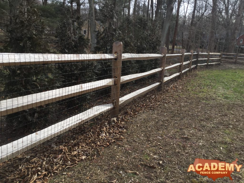 Post and rail with welded wire mesh attached, installed by Academy Fence Company in Florham Park, NJ.