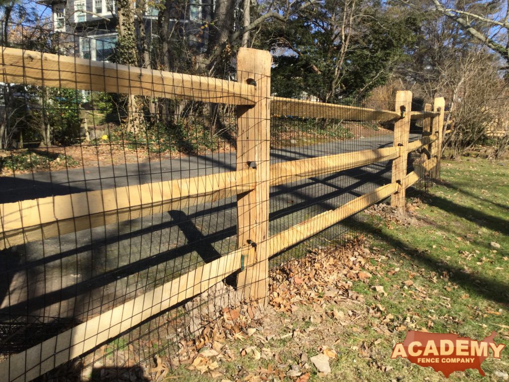 rustic split post and rail with welded wire mesh attached, installed by Academy Fence Company in Montville, NJ.