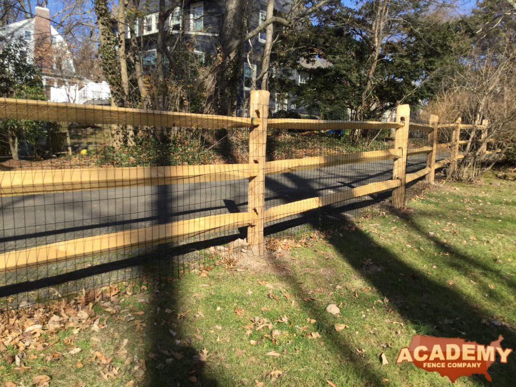 Post and rail with welded wire mesh attached, installed by Academy Fence Company in Morris Plains, NJ.