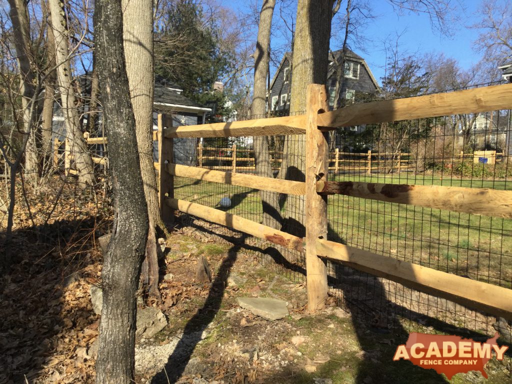 Post and rail with welded wire mesh attached installed by Academy Fence Company in New Providence, NJ. Union County.