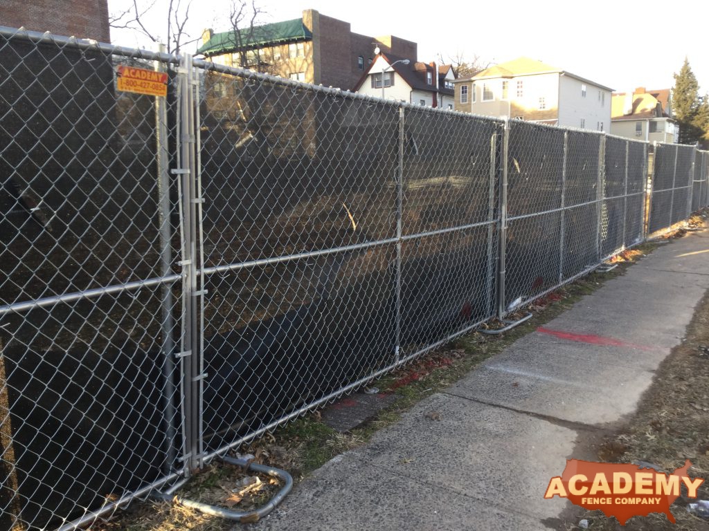 6' temporary chain link construction fence panels installed by Academy Fence Company in Morris Plains, NJ.