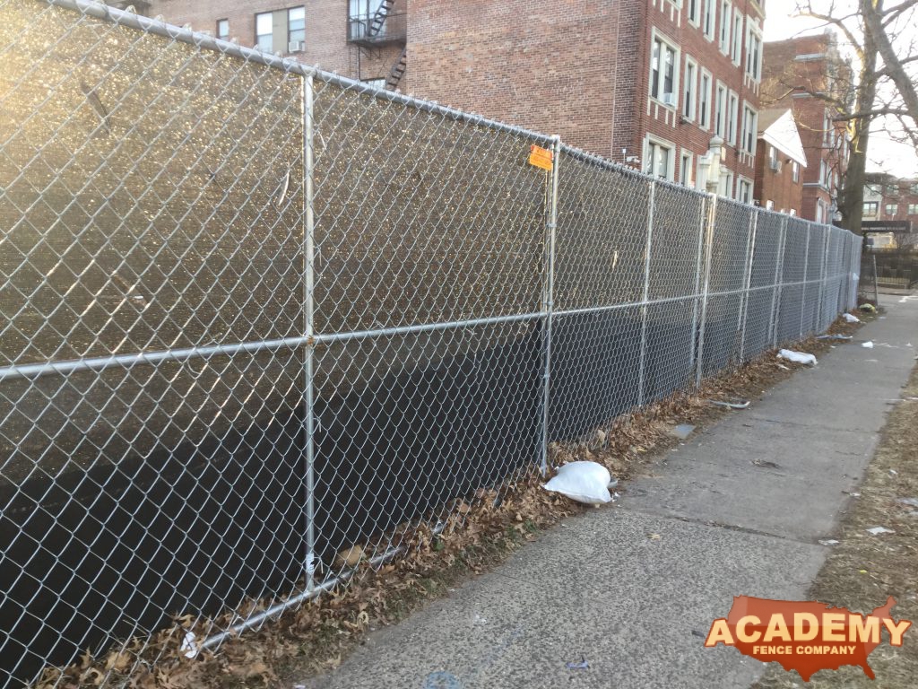 6' temporary chainlink construction fence panels installed by Academy Fence Company in Plainfield, NJ.