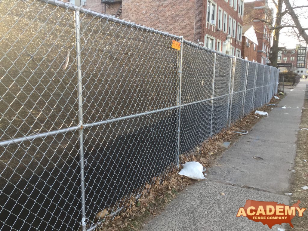 6' temporary chainlink construction fence panels installed by Academy Fence Company in Rutherford, NJ.