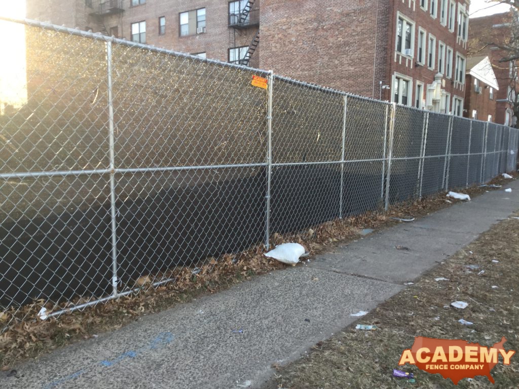 6' temporary chainlink construction fence panels installed by Academy Fence Company in Union, NJ.