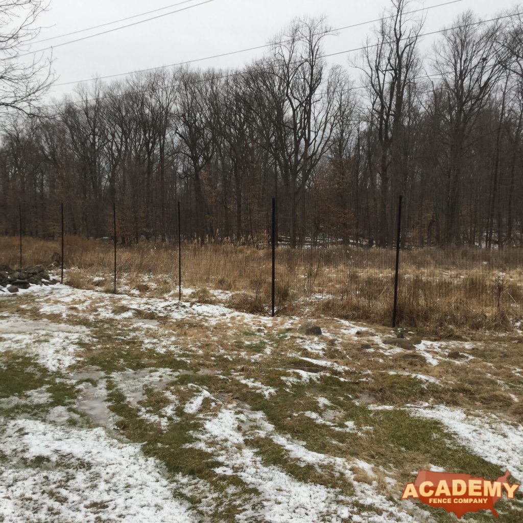 8′ black wire deer fence installed in Short Hills NJ, by Academy Fence Company.